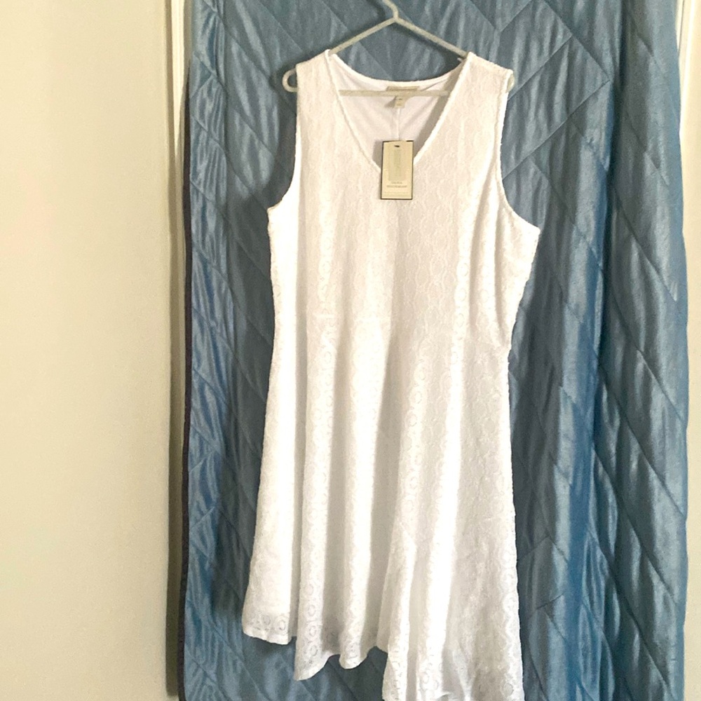 New & Tagged! XL, white sleeveless dress with flare bottom.